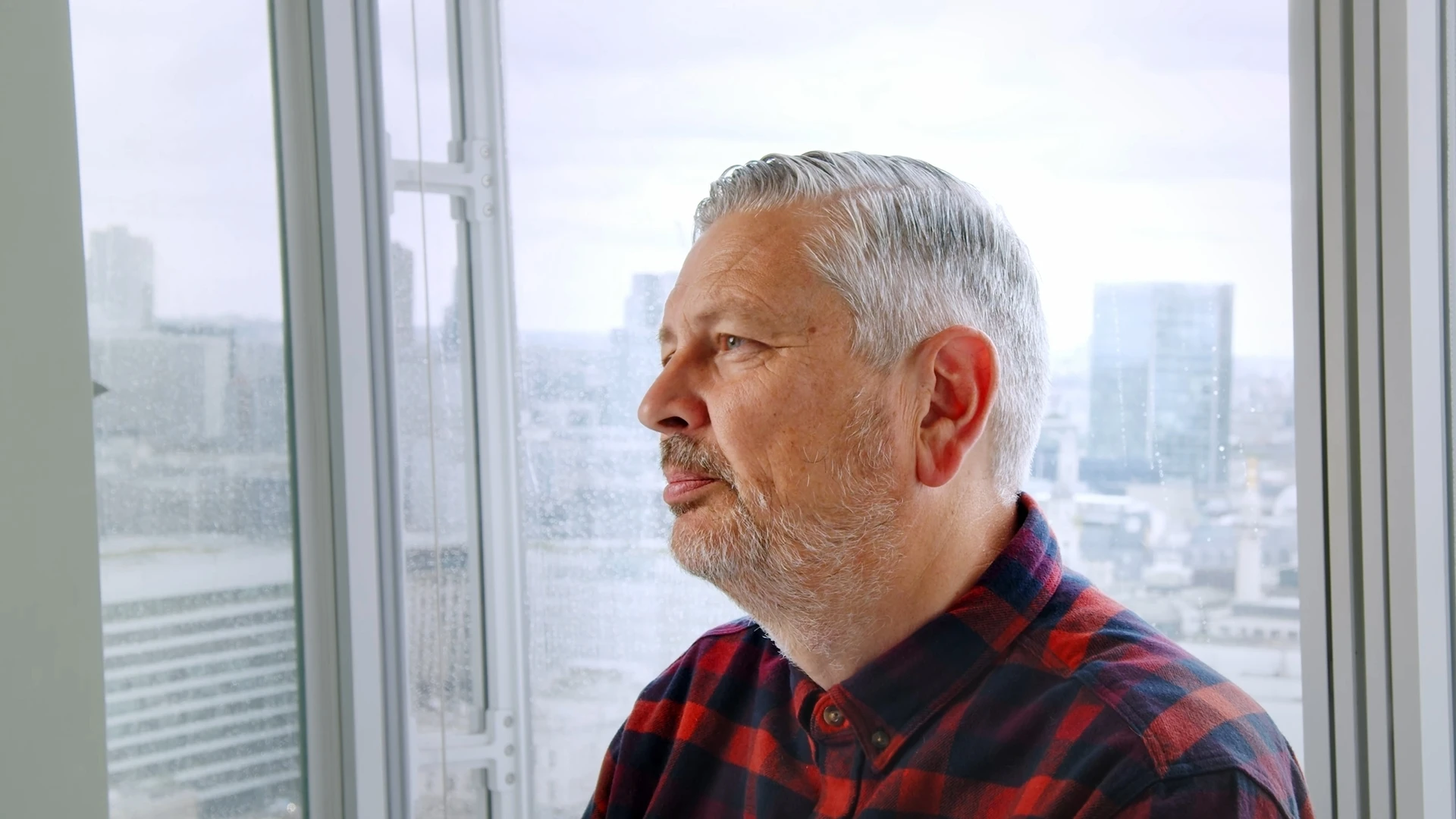 Richard Owen, Head of Innovation and Transformation at Firefish, looking out across the London skyline