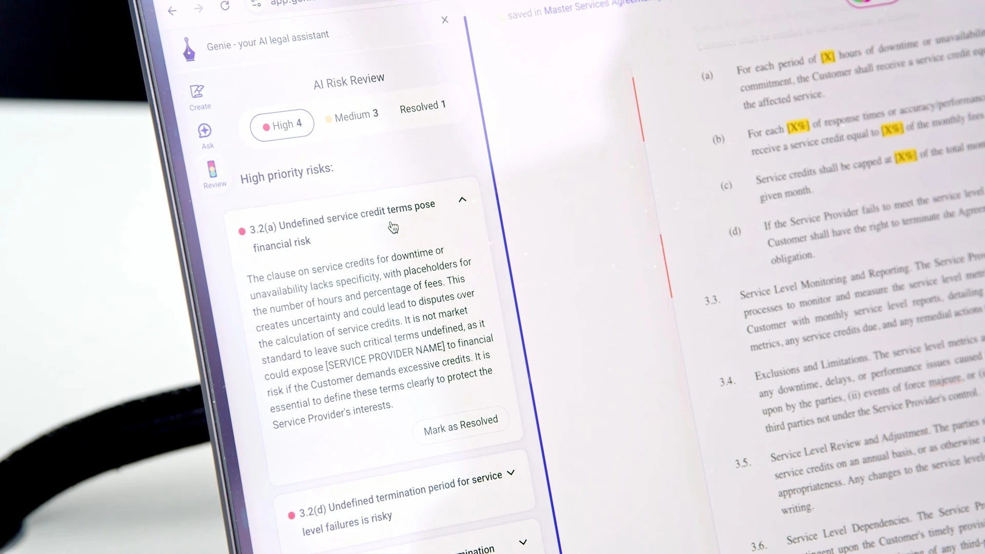 GenieAI AI Risk Review interface flagging high-priority clauses on a service-level agreement